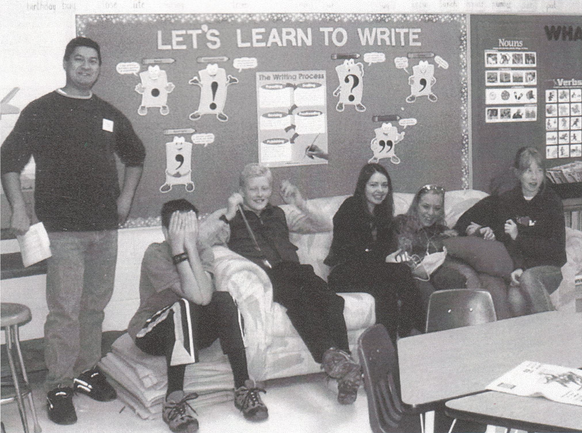 Mark Newman with the youth group in 2004, in temporary lodgings at Holy Spirit School.
